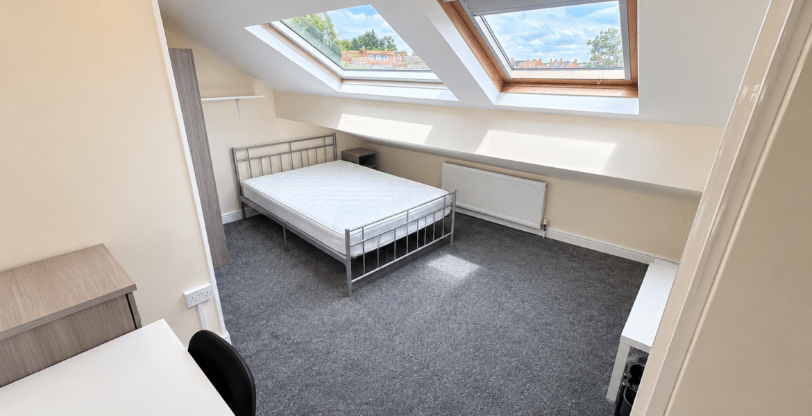 Bright Minimalist Attic Bedroom