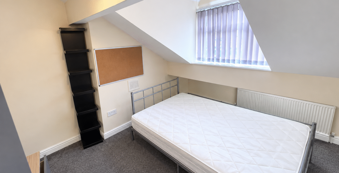 Minimalist Attic Bedroom with Dormer Window