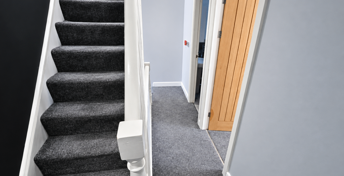 Modern Grey Carpeted Staircase Hallway