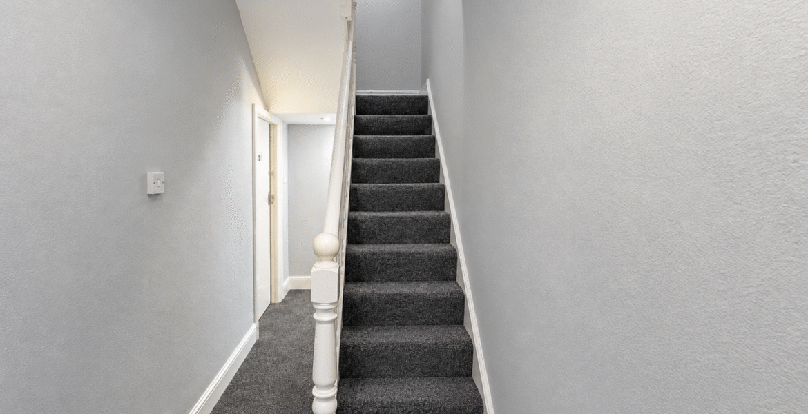 Modern Grey Carpeted Stairwell